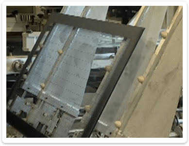 Tilting Conveyor for Easy Glass Loading Tilting Conveyor for Easy Glass Loading