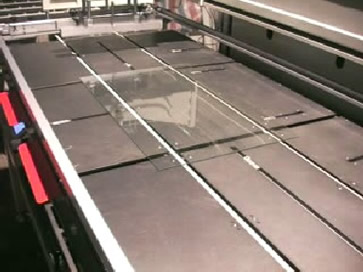Conveyor Belts Bring Glass into Screen Printer & Stop at Correct Position within Positioning Pins Conveyor Belts Bring Glass into Screen Printer & Stop at Correct Position within Positioning Pins