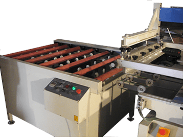 Printed Glass Stops on Outlet Conveyor Ready for Unloading Printed Glass Stops on Outlet Conveyor Ready for Unloading