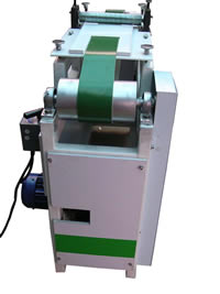 Pieces of glass unloaded from other end of belt conveyor for collection Thin-glass-breakout-machine.jpg
