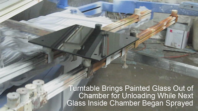 Glass Being Painted Inside Spraying Chamber Glass Being Painted Inside Spraying Chamber